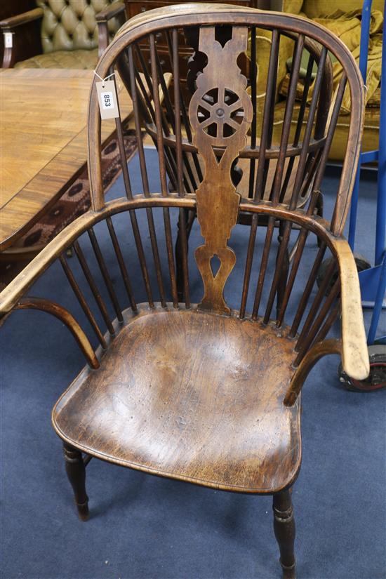 A pair of stick back Windsor chairs